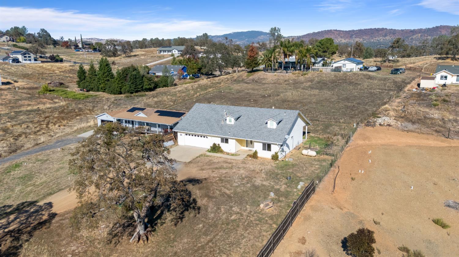 3493 Quail Hill Road Copperopolis, CA 95228 - Photo 7 of 38 an aerial view of a house with a yard