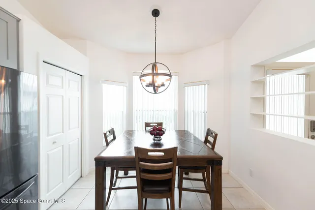 a kitchen with a sink stainless steel appliances and cabinets