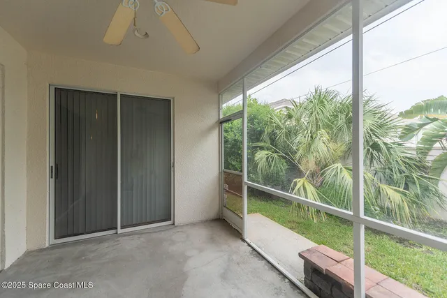 a view of backyard with green space