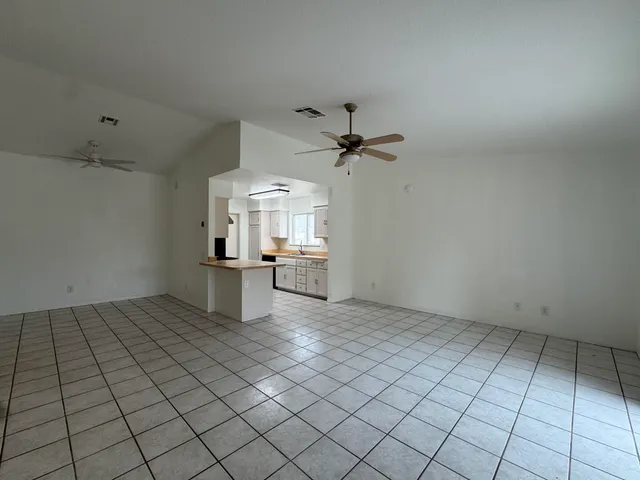 a view of a livingroom and entryway