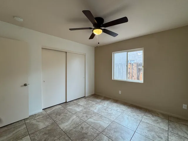 a view of an empty room and window