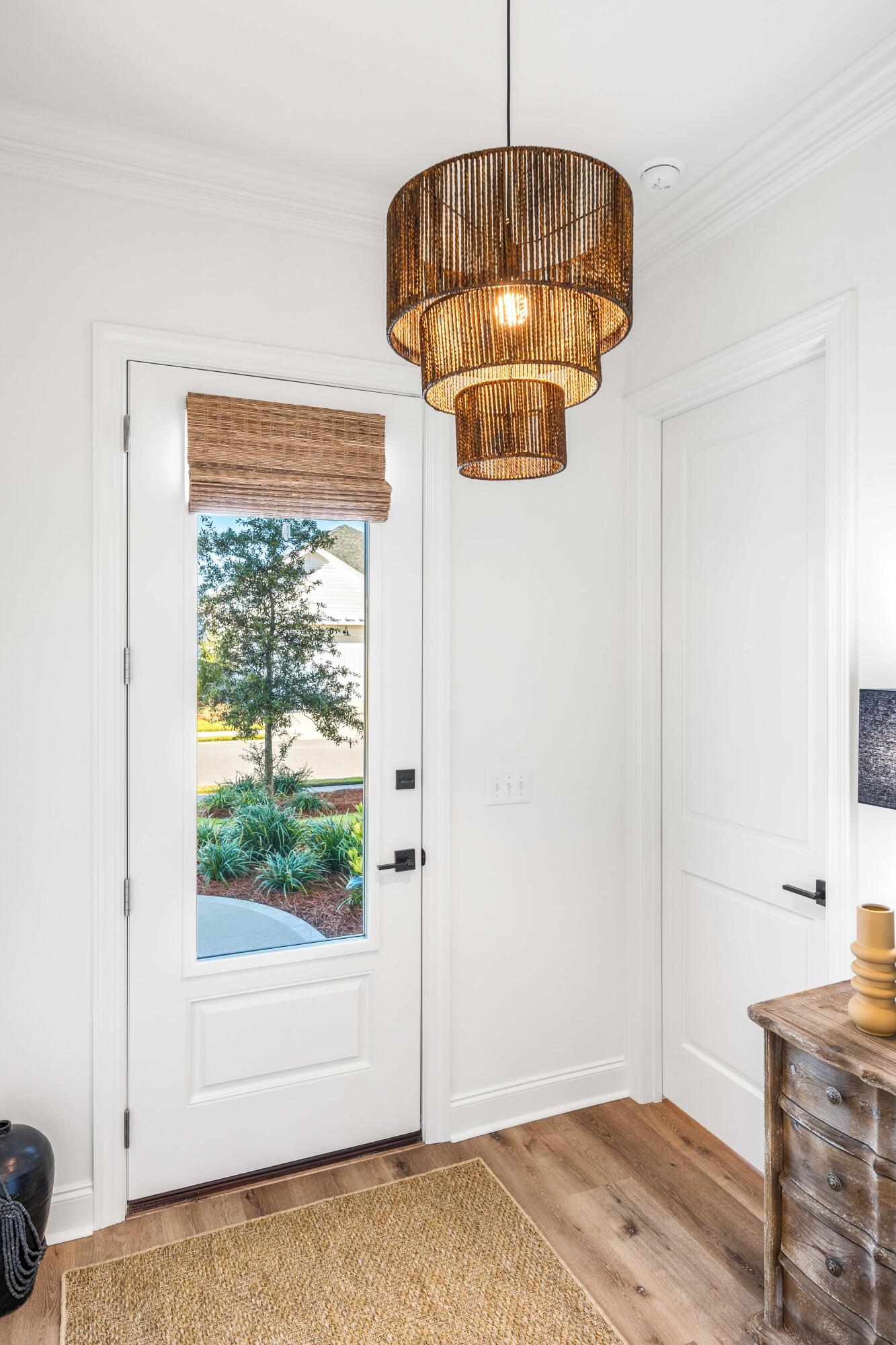 59 Suwannee Dr Inlet Beach Inlet Beach, FL 32461 - Photo 15 of 47 an empty room with a chandelier fan and wooden floor