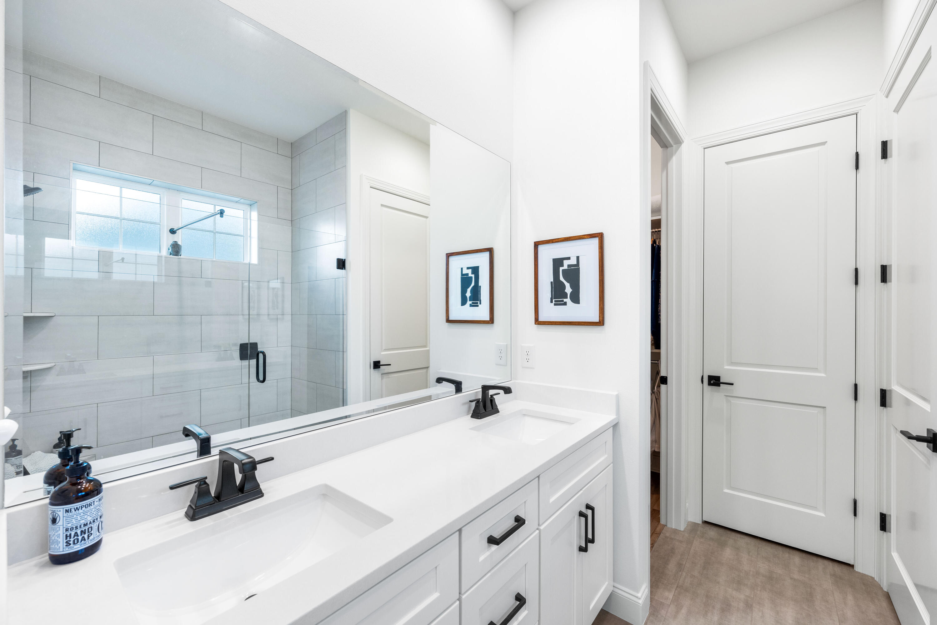 59 Suwannee Dr Inlet Beach Inlet Beach, FL 32461 - Photo 28 of 47 a bathroom with a sink a mirror and a shower