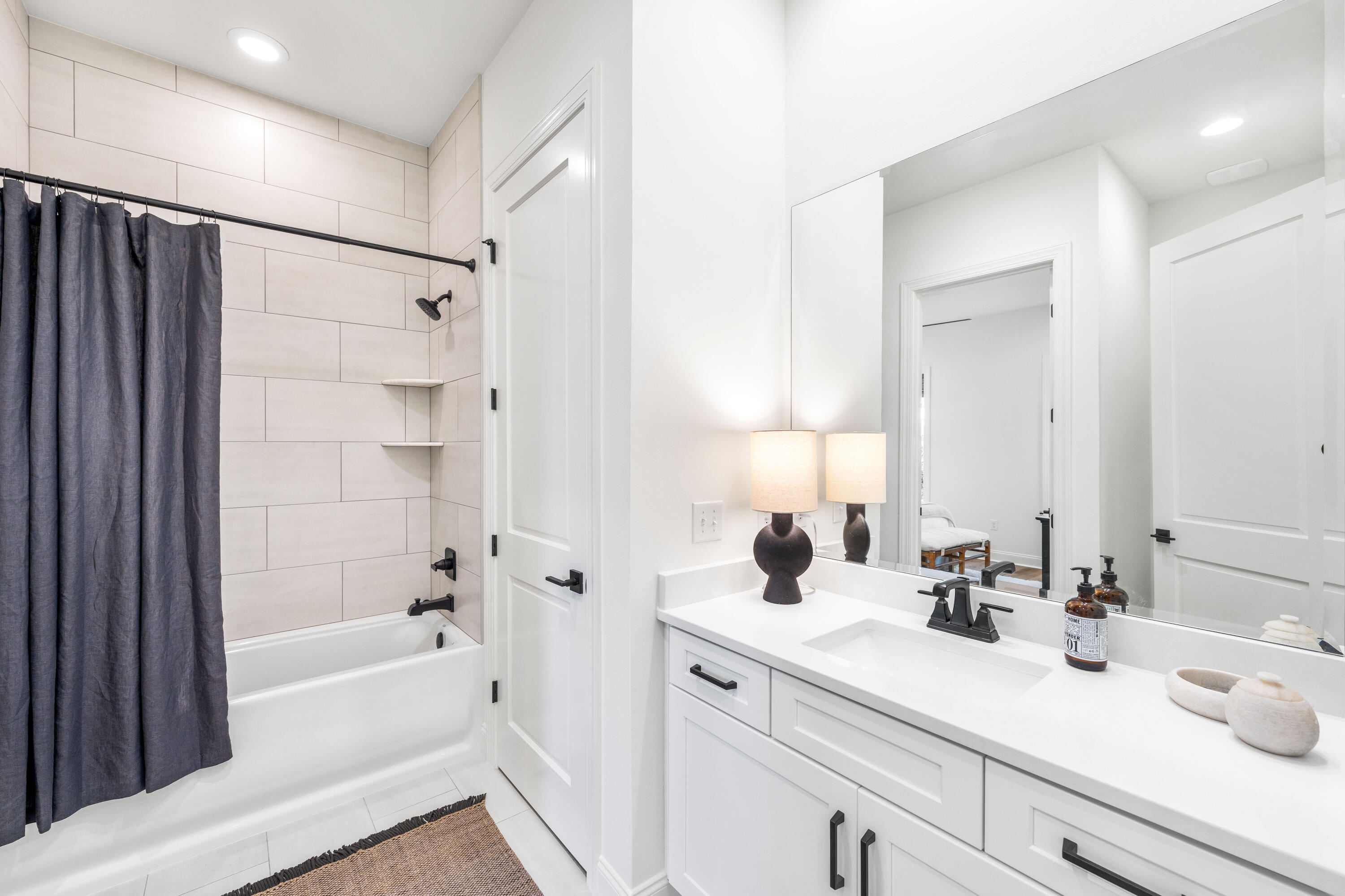 59 Suwannee Dr Inlet Beach Inlet Beach, FL 32461 - Photo 35 of 47 a bathroom with a sink double vanity mirror and bathtub