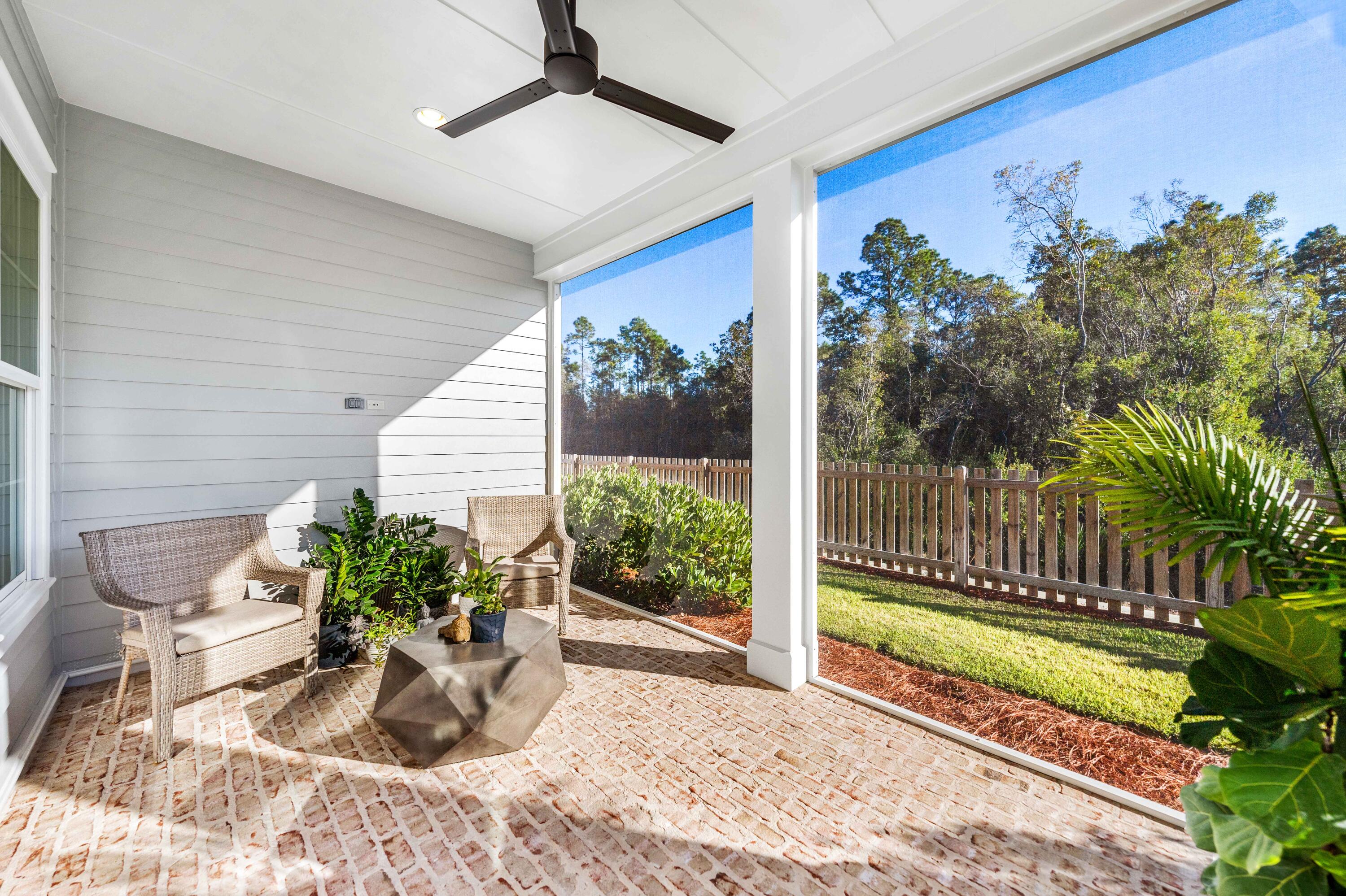 59 Suwannee Dr Inlet Beach Inlet Beach, FL 32461 - Photo 4 of 47 a view of a potted plants in back of a house