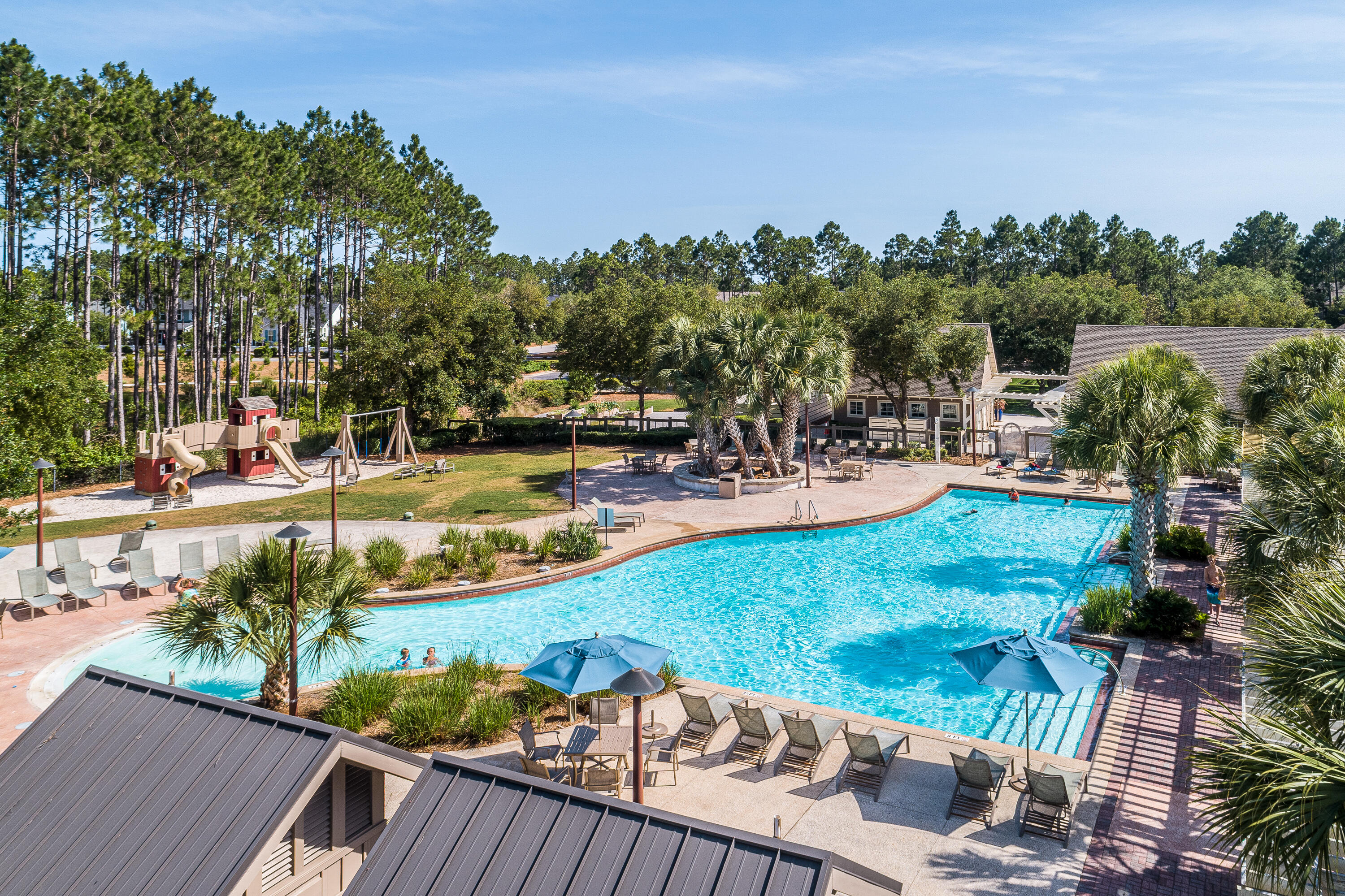 59 Suwannee Dr Inlet Beach Inlet Beach, FL 32461 - Photo 43 of 47 a view of a swimming pool with a patio and a garden