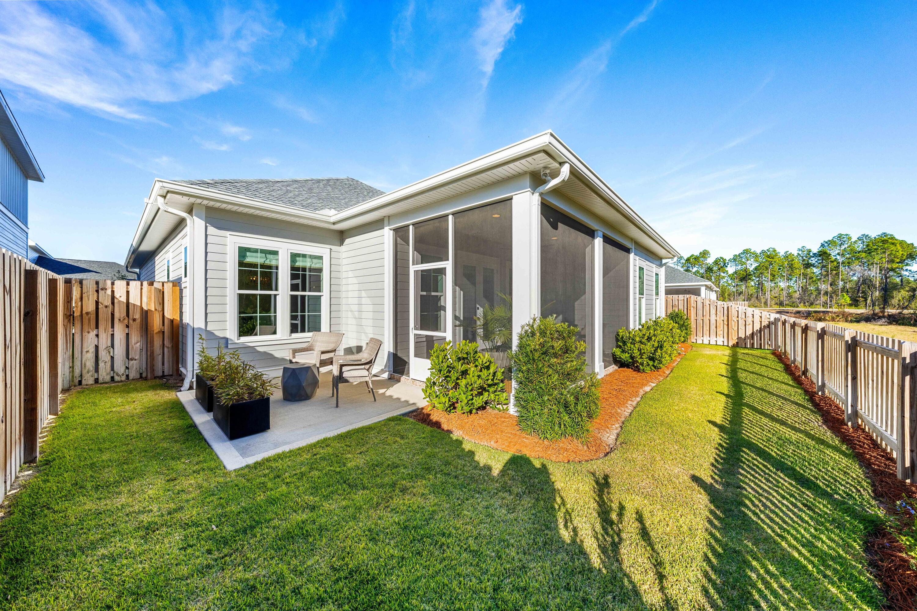 59 Suwannee Dr Inlet Beach Inlet Beach, FL 32461 - Photo 8 of 47 a view of a house with backyard and sitting area