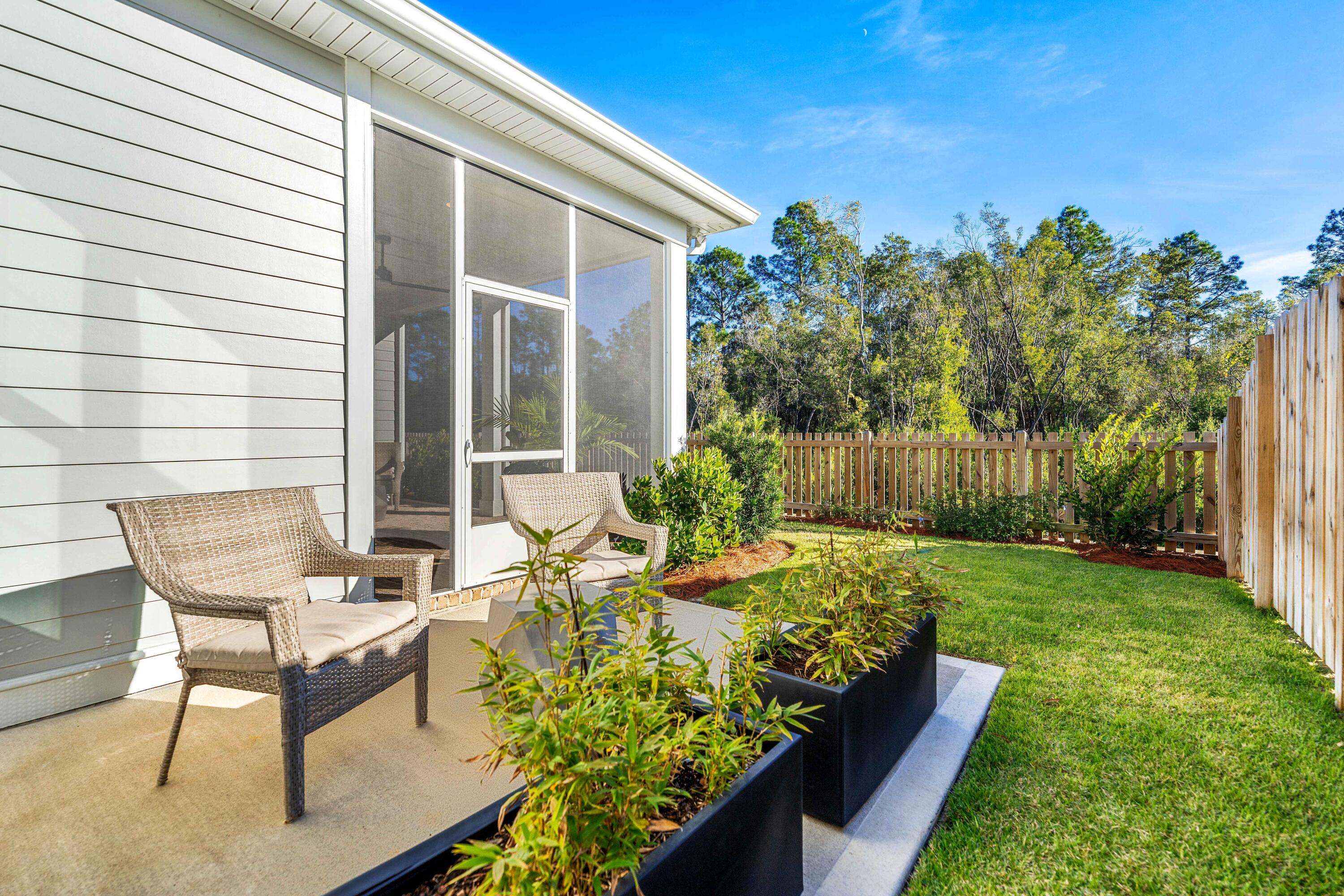 59 Suwannee Dr Inlet Beach Inlet Beach, FL 32461 - Photo 9 of 47 a view of a house with backyard and sitting area