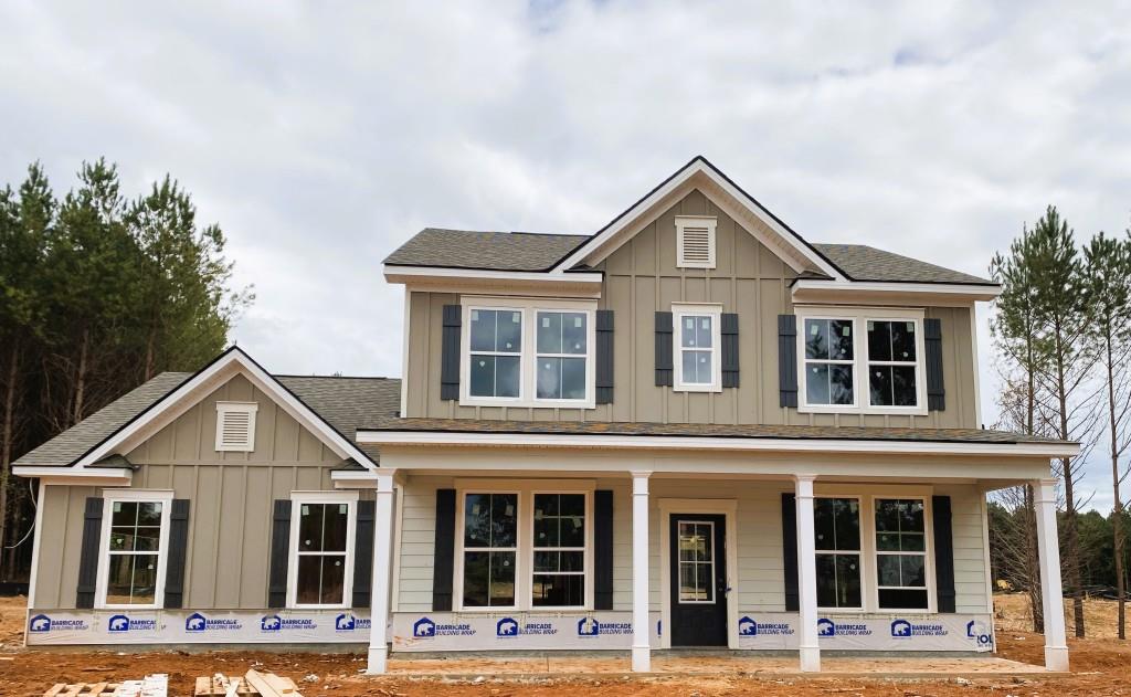 841 Cattle Barn Road Monroe, GA 30656 - Photo 1 of 1 front view of a house with a yard