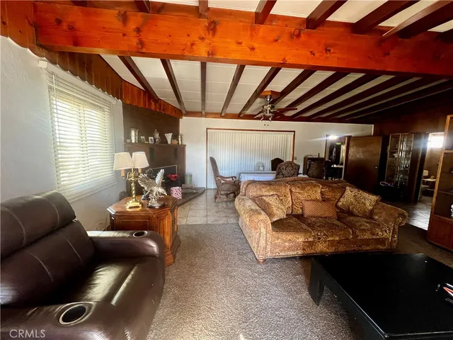 a bed room with a bed and a window