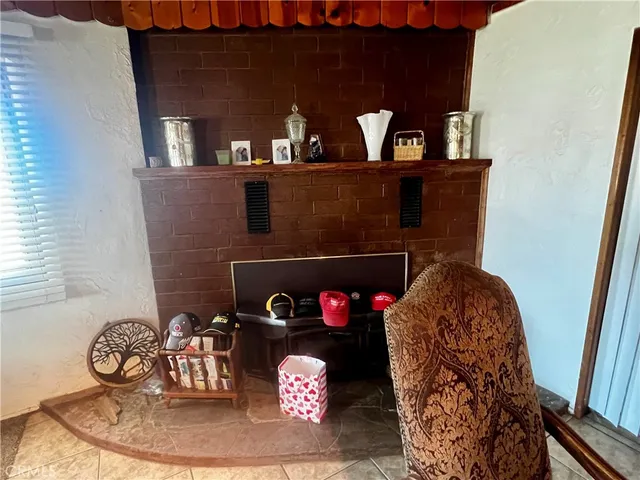 a kitchen with a refrigerator and cabinets