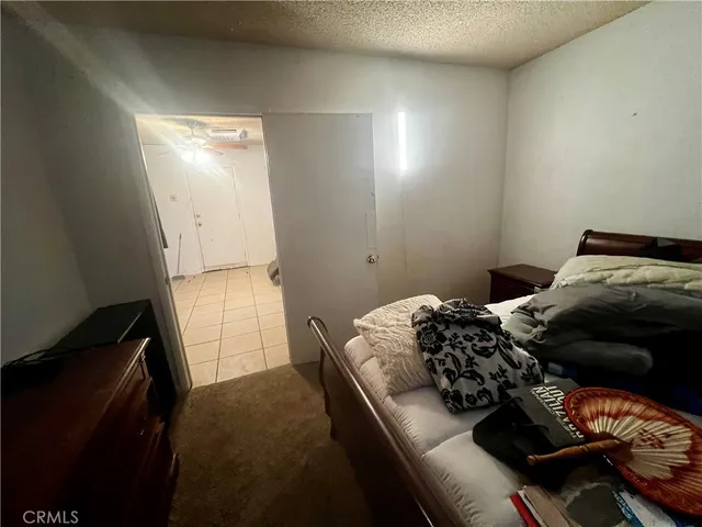 a blue and white car parked in a garage