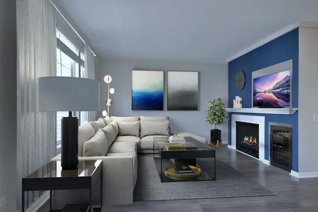 a living room with furniture and a fireplace