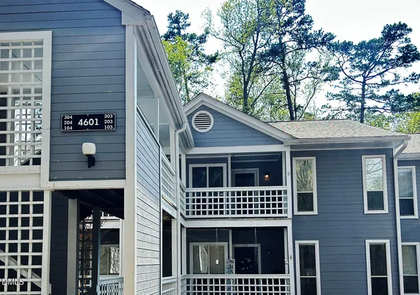 a view of outdoor space and front view of a house