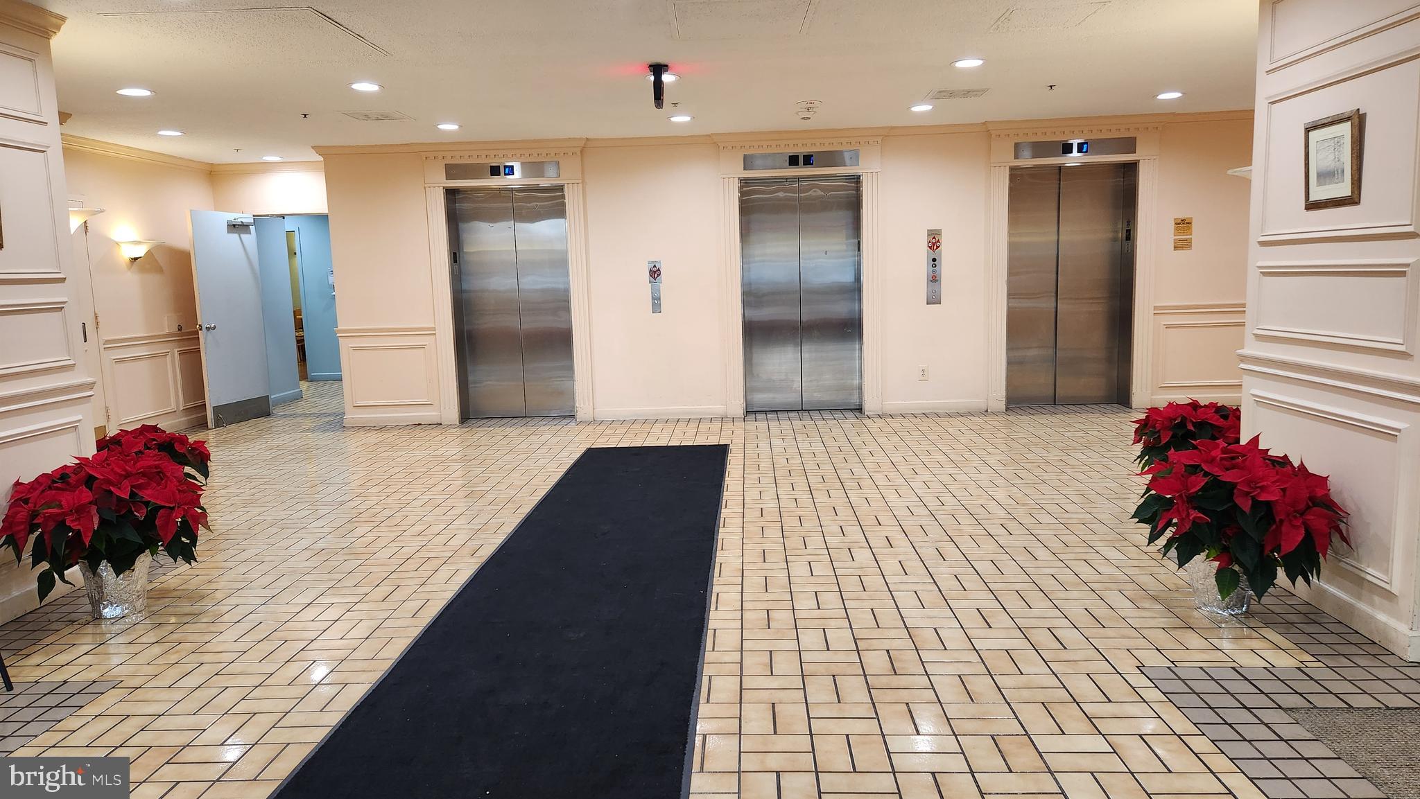 15115 Interlachen Drive, Unit 3801 Silver Spring, MD 20906 - Photo 28 of 54 Elevators in the Lobby