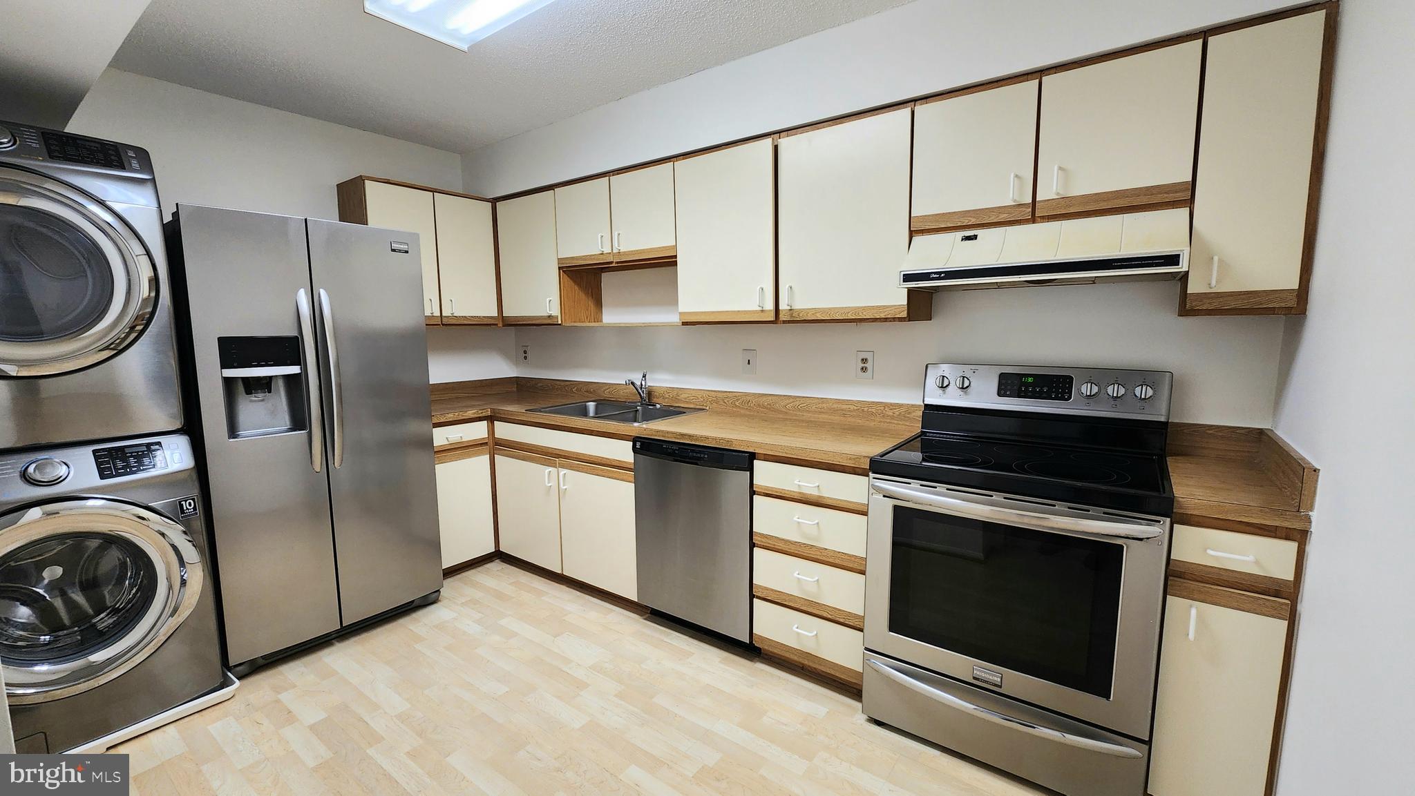 15115 Interlachen Drive, Unit 3801 Silver Spring, MD 20906 - Photo 9 of 54 Kitchen with LVP flooring