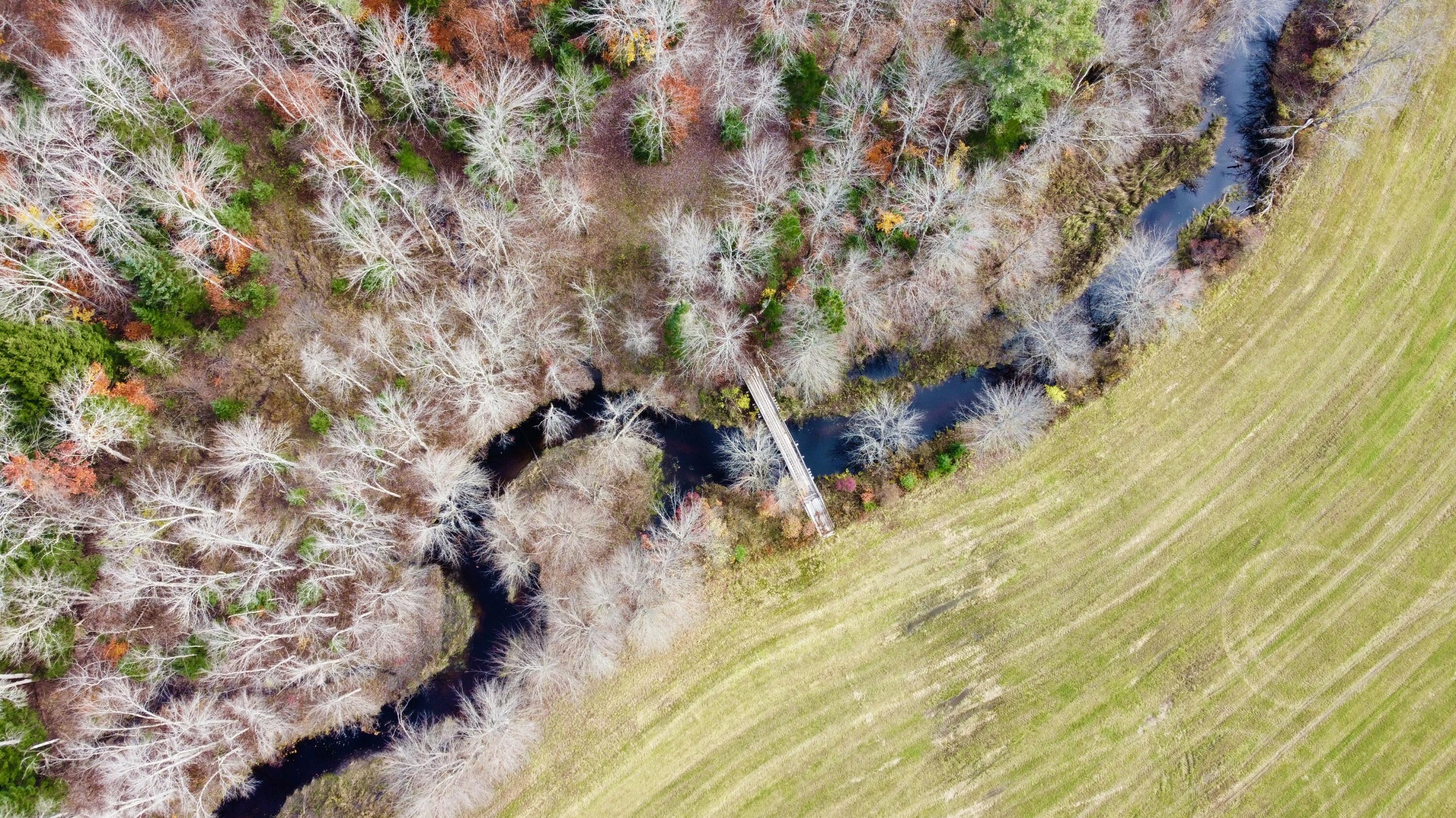 758 Buckfield Road Hebron, ME 04238 - Photo 8 of 68 Bridge connecting lower field over brook