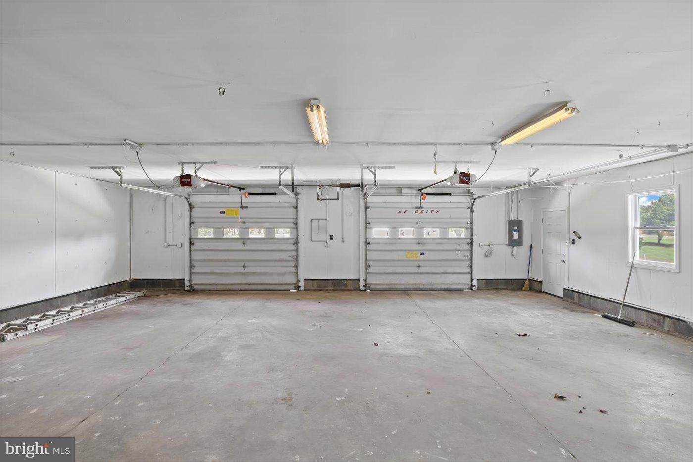 6417 Courthouse Road Spotsylvania, VA 22551 - Photo 3 of 42 Concrete floor, dual garage openers