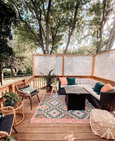a outdoor space with patio the couches and a dining table with the garden view