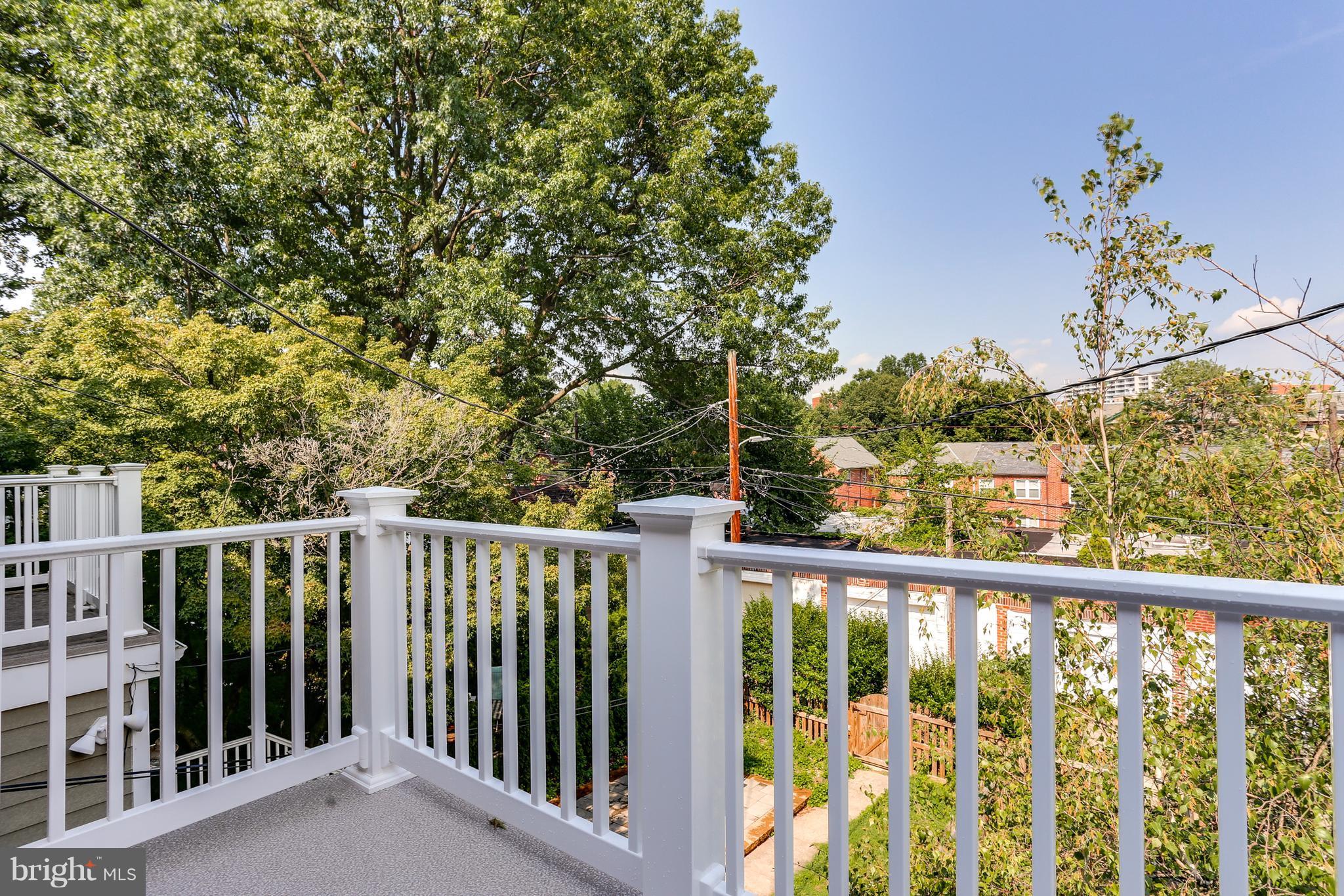 3921 Keswick Road Baltimore, MD 21211 - Photo 22 of 25 New deck off the second story of the home