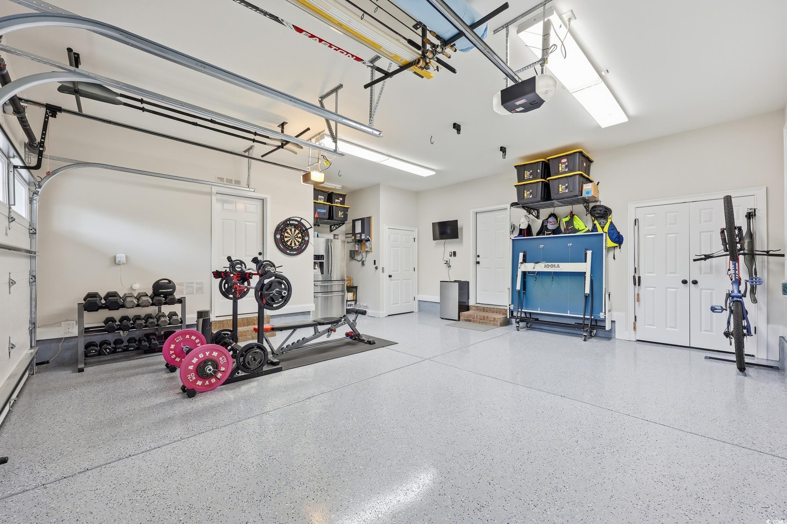 349 St.Julian Lane Myrtle Beach, SC 29579 - Photo 32 of 40 Epoxy flooring with attached workshop