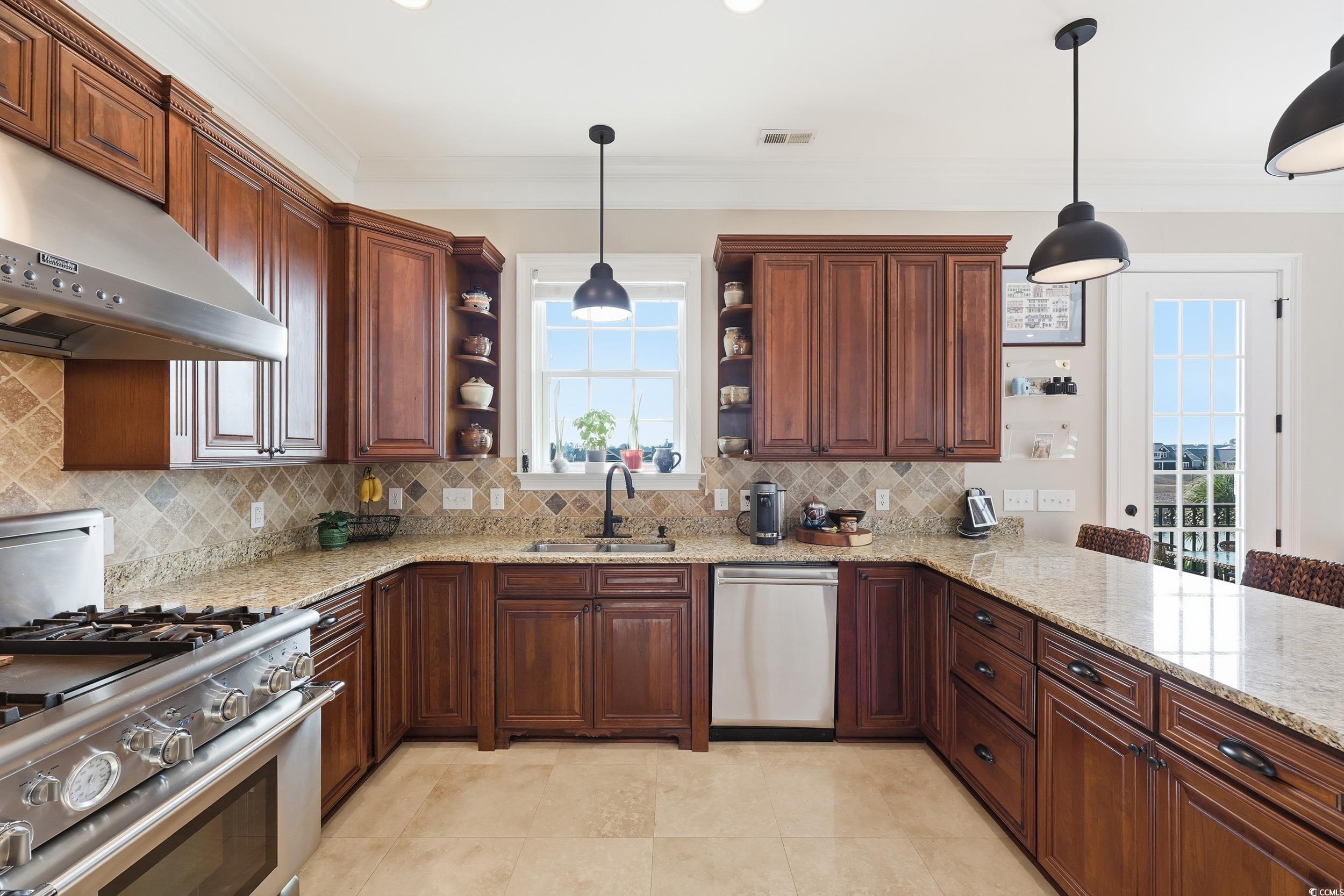 349 St.Julian Lane Myrtle Beach, SC 29579 - Photo 9 of 40 Kitchen featuring open shelves, stainless steel appliances, under cabinet range hood, light stone counters, and backsplash