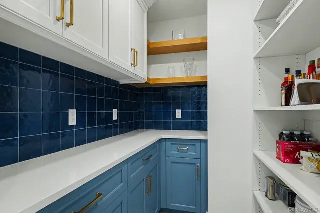 a view of storage and utility room