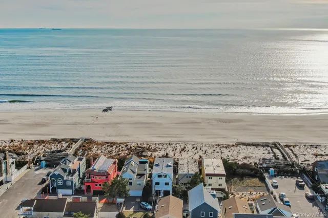 a view of a water heater room with a floor to ceiling window