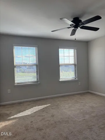 en empty room with windows