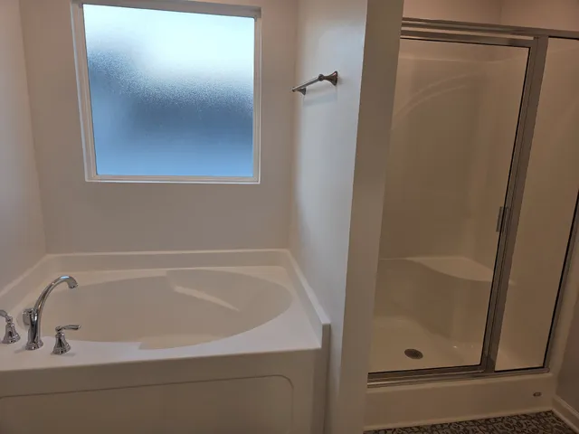 a bathroom with a toilet and a sink