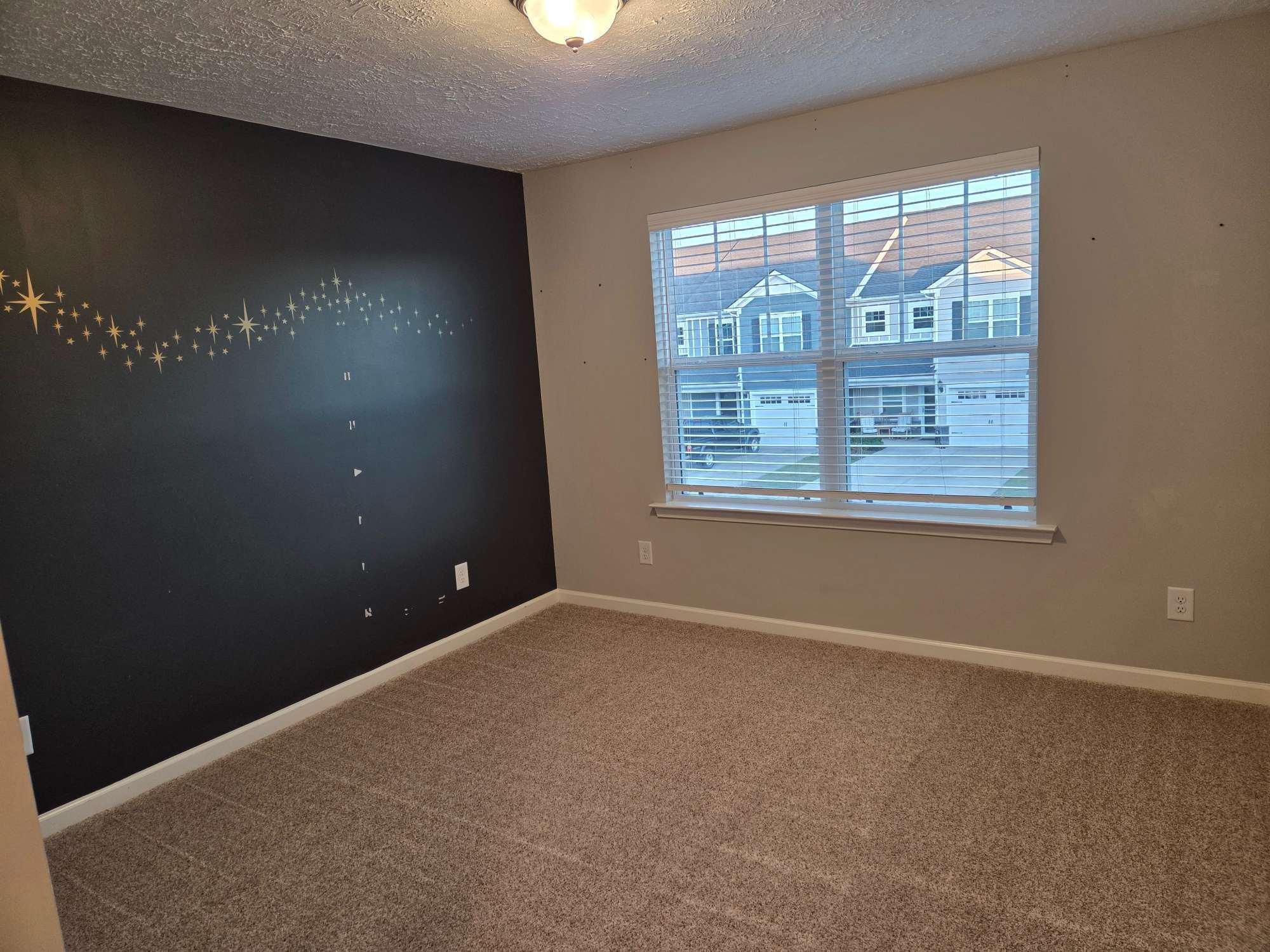 1709 Calypso Drive Murfreesboro, TN 37128 - Photo 13 of 16 a view of an empty room with a window