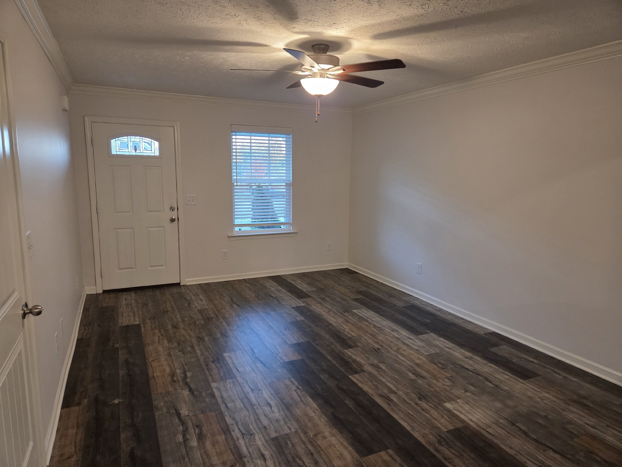 1709 Calypso Drive Murfreesboro, TN 37128 - Photo 2 of 16 wooden floor in an empty room with a window