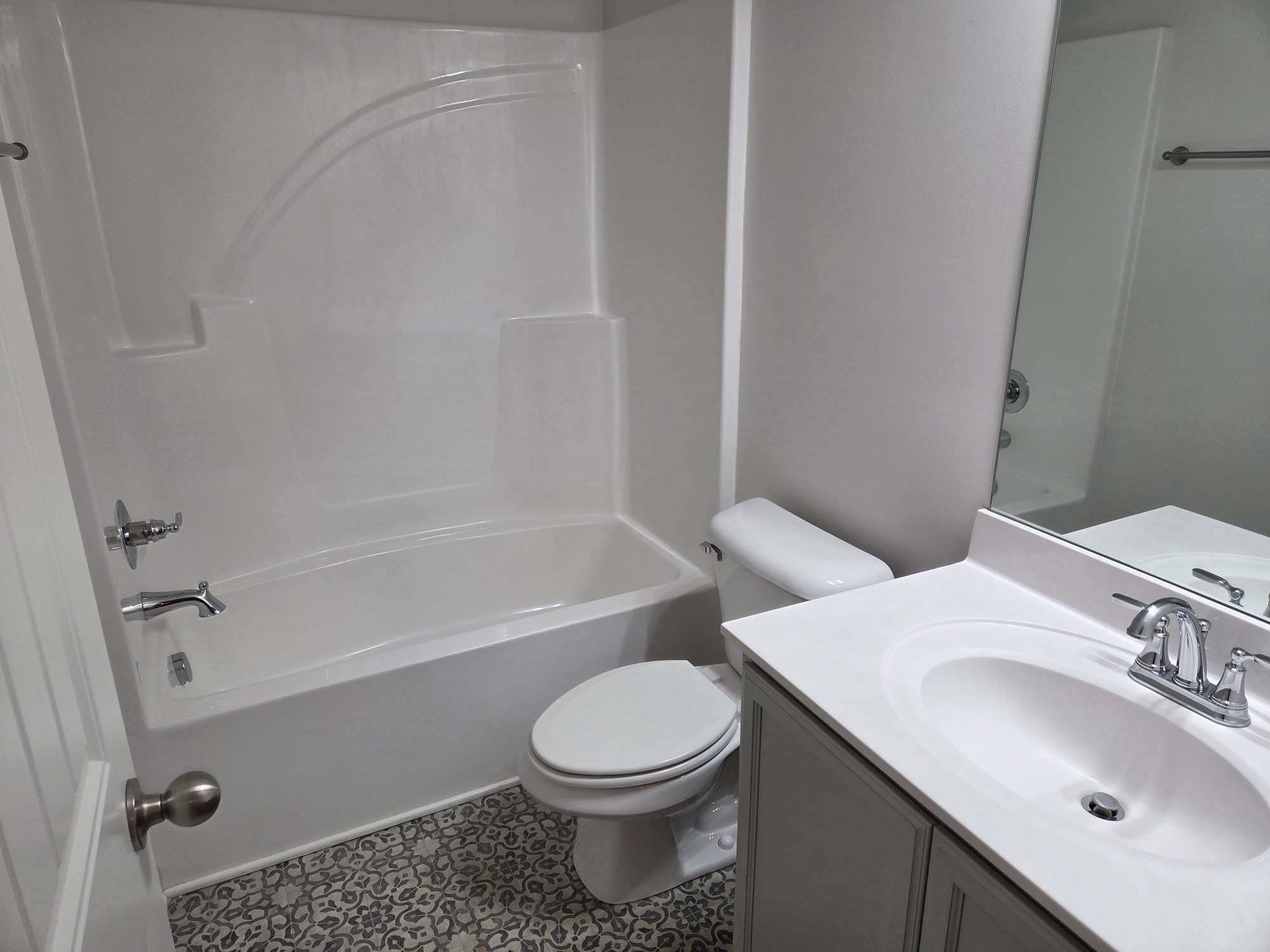 1709 Calypso Drive Murfreesboro, TN 37128 - Photo 7 of 16 a bathroom with a sink toilet and shower