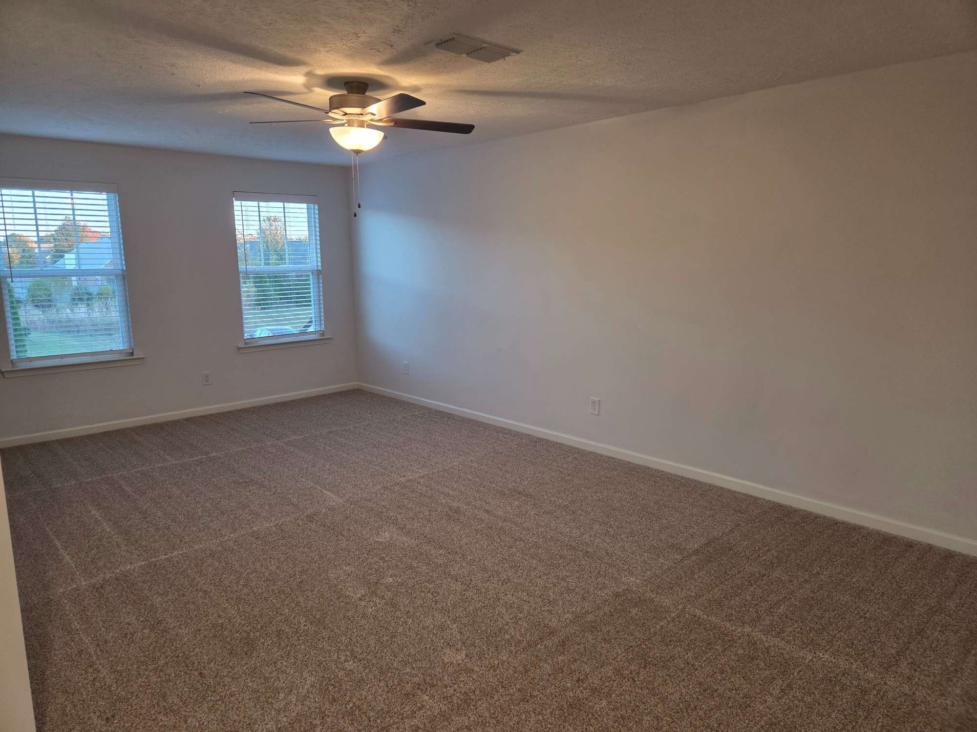 1709 Calypso Drive Murfreesboro, TN 37128 - Photo 9 of 16 an empty room with windows and fan