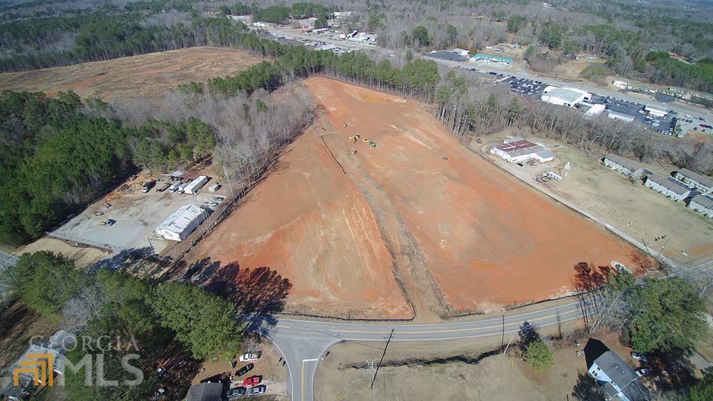 269 Old Bremen Road Carrollton, GA 30117 - Photo 1 of 8 a aerial view of a house with a yard and lake view