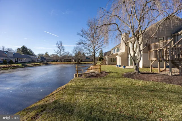 a view of a lake with a house