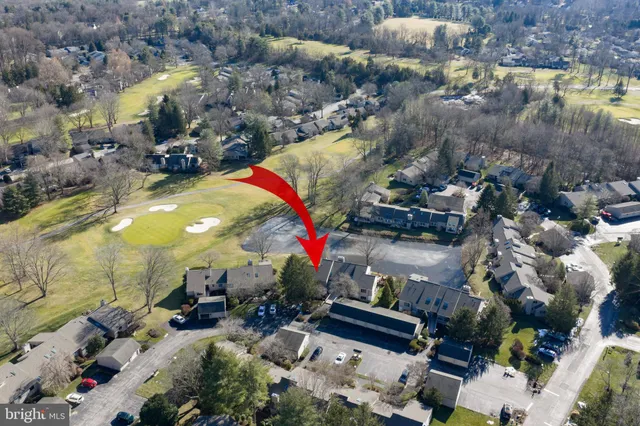 a view of swimming pool patio and outdoor seating