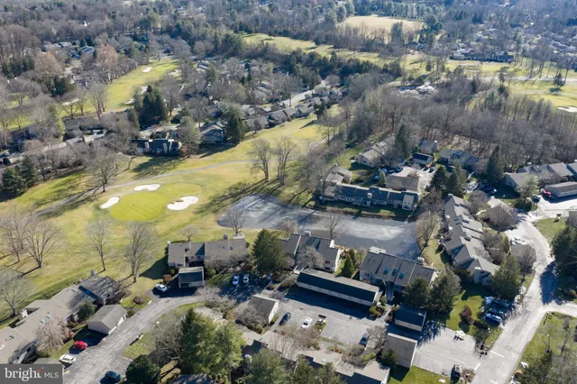 a view of swimming pool and outdoor seating