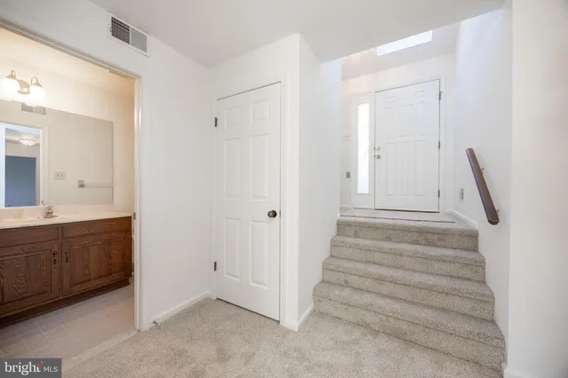 a view of an entryway with staircase