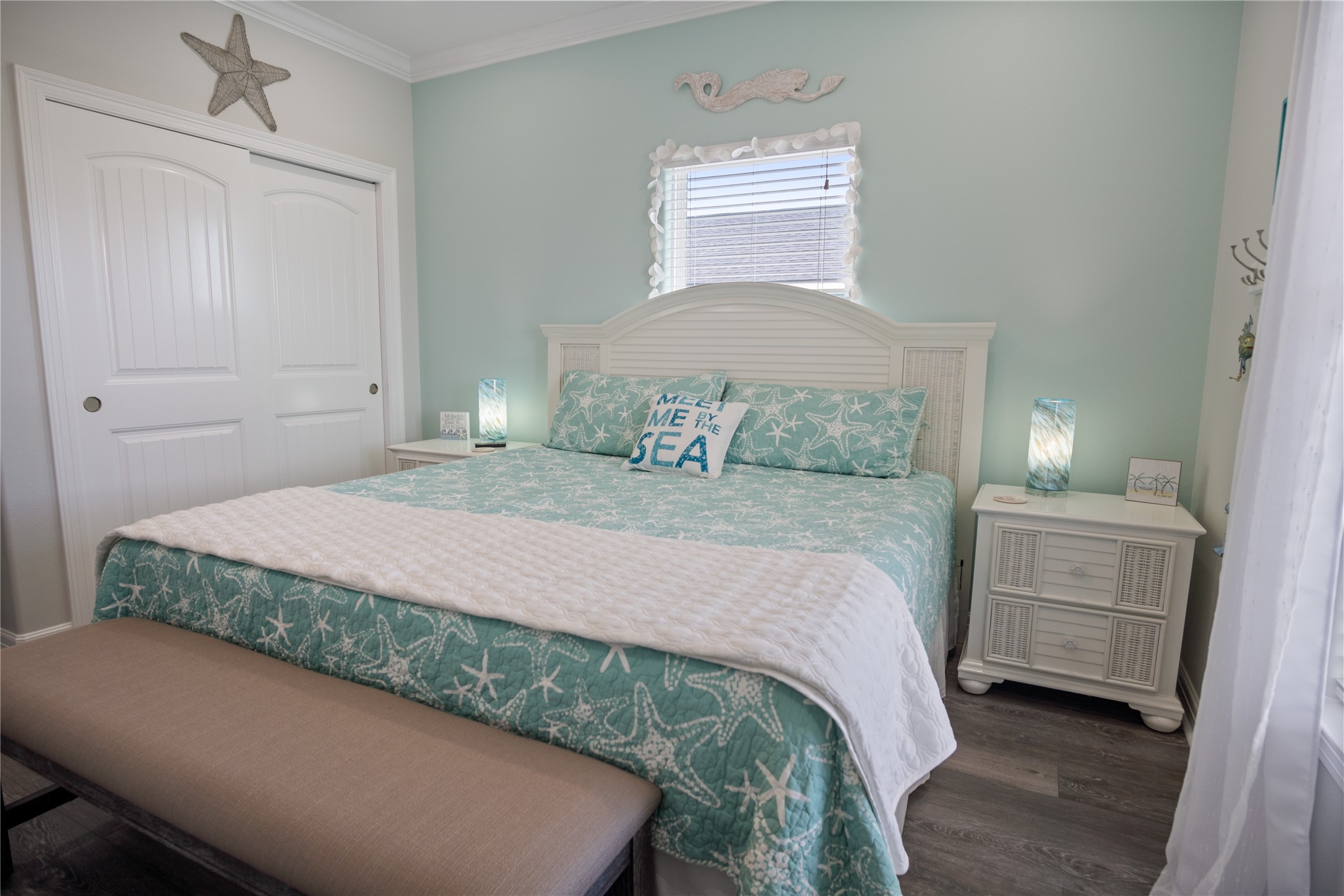 956 Biscayne Crystal Beach, TX 77650 - Photo 19 of 46 a bedroom with a bed and a cabinets