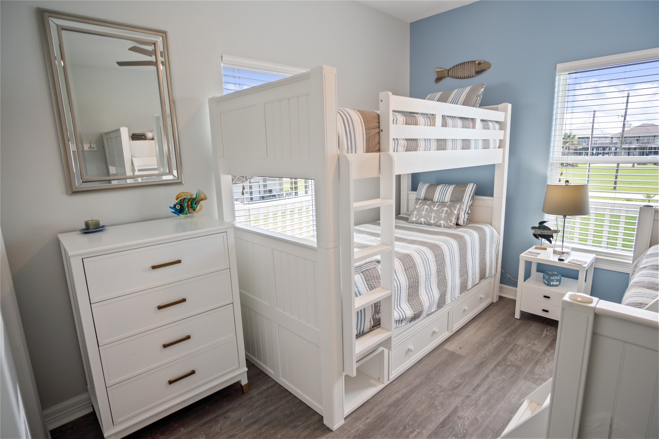 956 Biscayne Crystal Beach, TX 77650 - Photo 26 of 46 a bedroom with a bed and a window