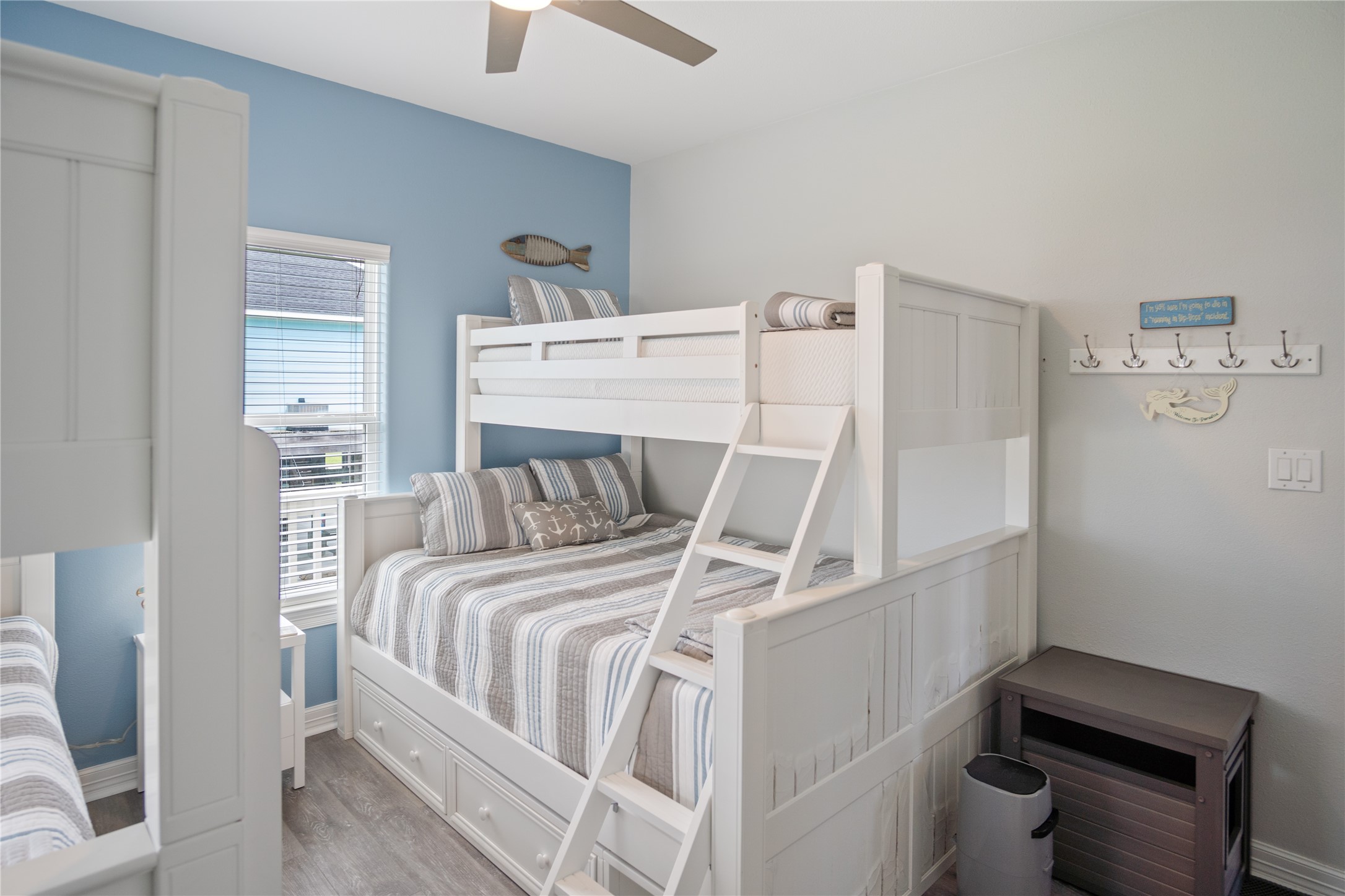 956 Biscayne Crystal Beach, TX 77650 - Photo 27 of 46 a bed sitting in a bedroom next to a window