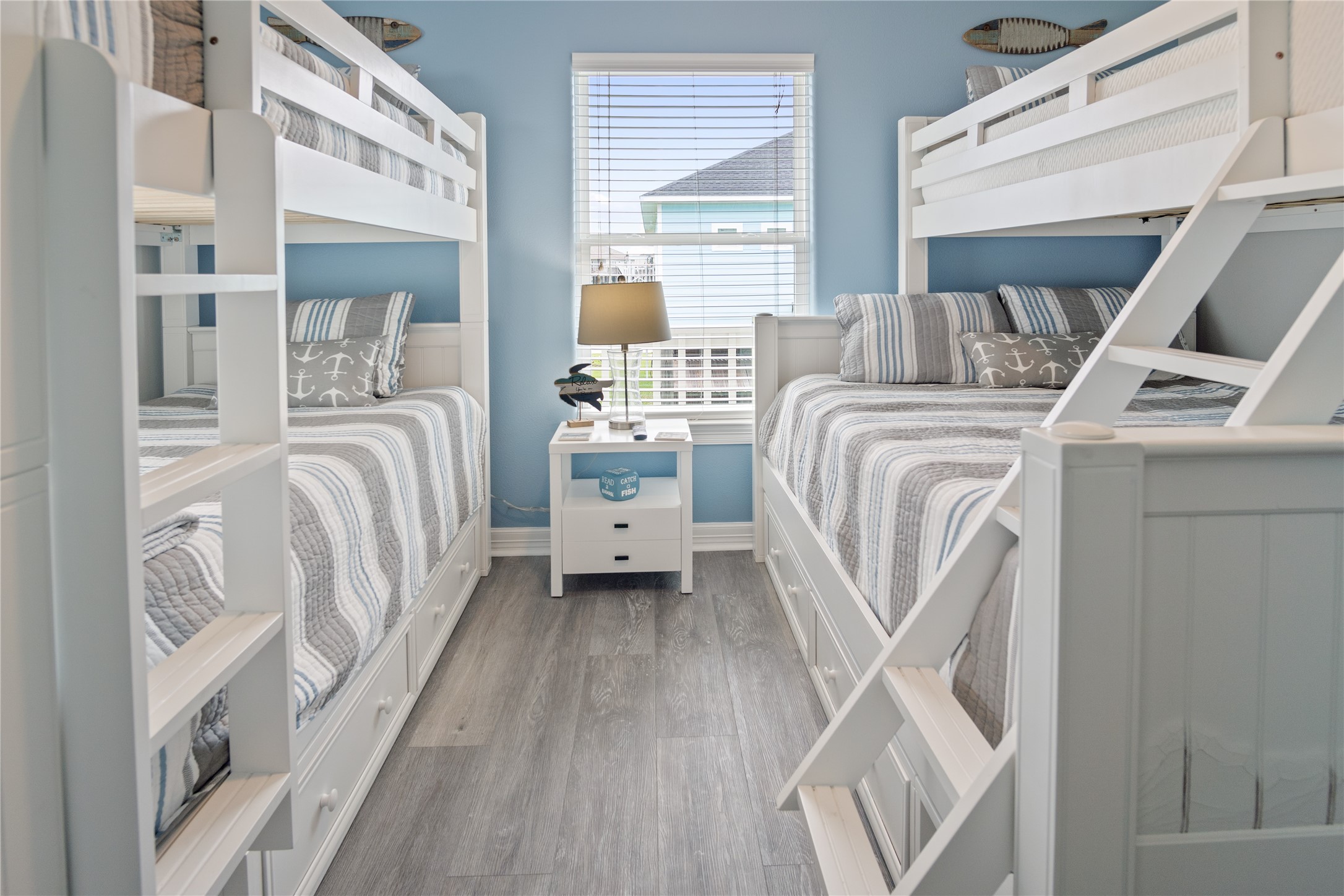 956 Biscayne Crystal Beach, TX 77650 - Photo 28 of 46 a bedroom with a bed and a window