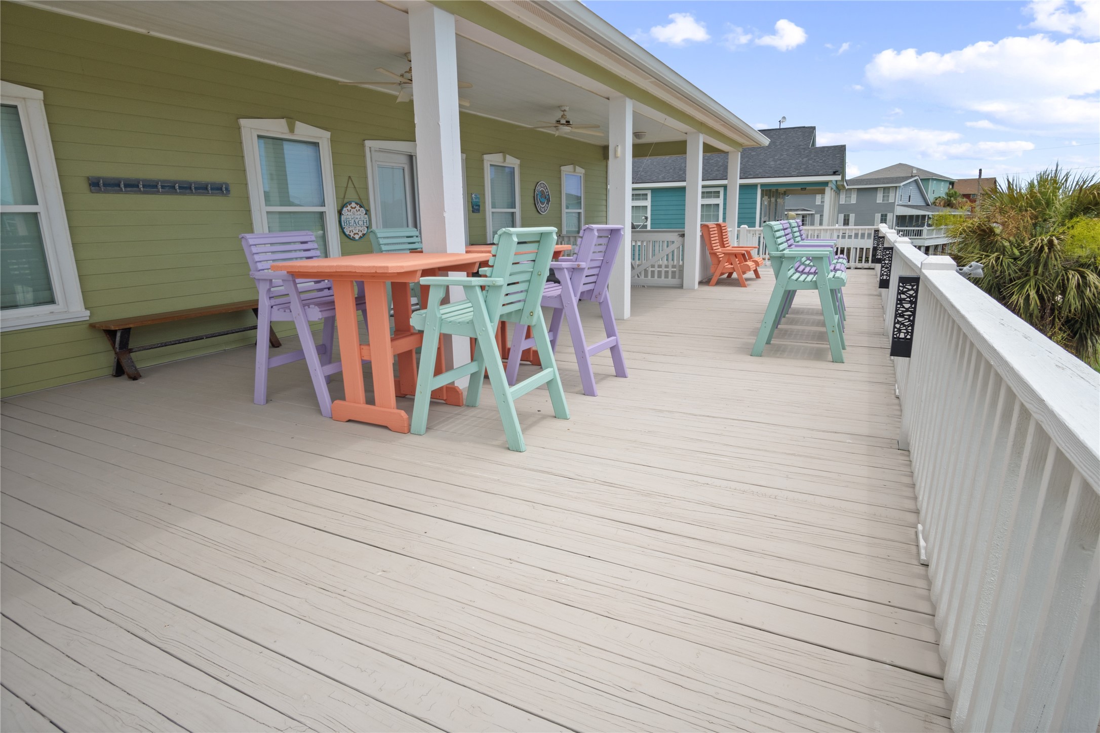956 Biscayne Crystal Beach, TX 77650 - Photo 32 of 46 a view of a patio with dining table and chairs