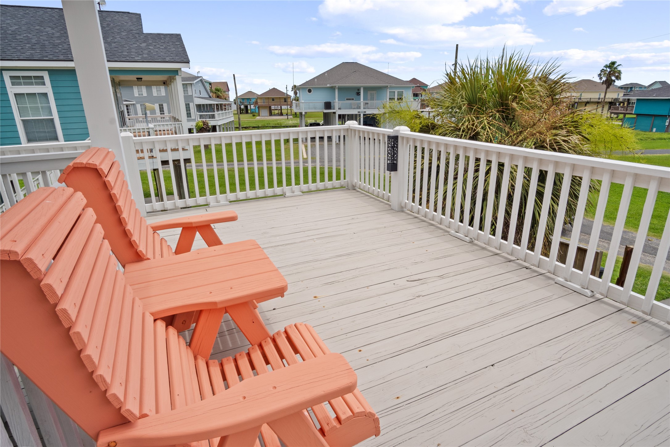 956 Biscayne Crystal Beach, TX 77650 - Photo 33 of 46 a view of a two chairs on the roof deck