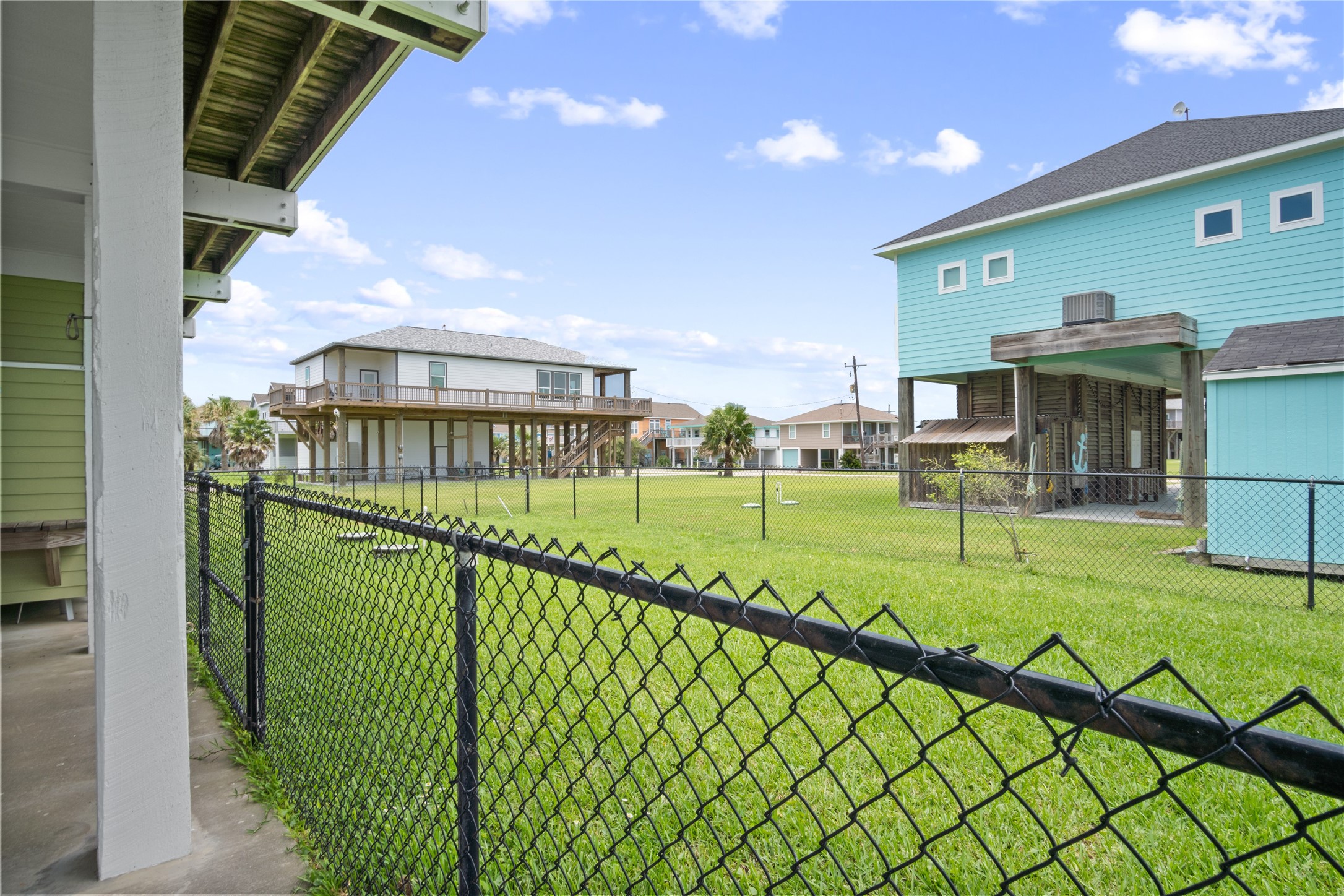 956 Biscayne Crystal Beach, TX 77650 - Photo 41 of 46 a view of an outdoor space and yard from a balcony