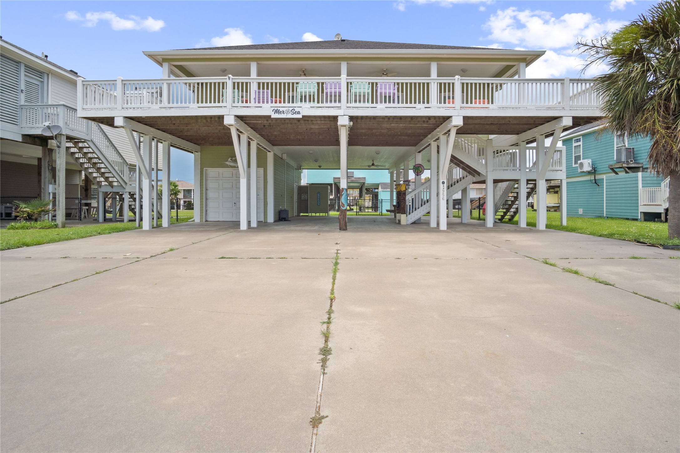 956 Biscayne Crystal Beach, TX 77650 - Photo 42 of 46 a backyard of a house with table and chairs