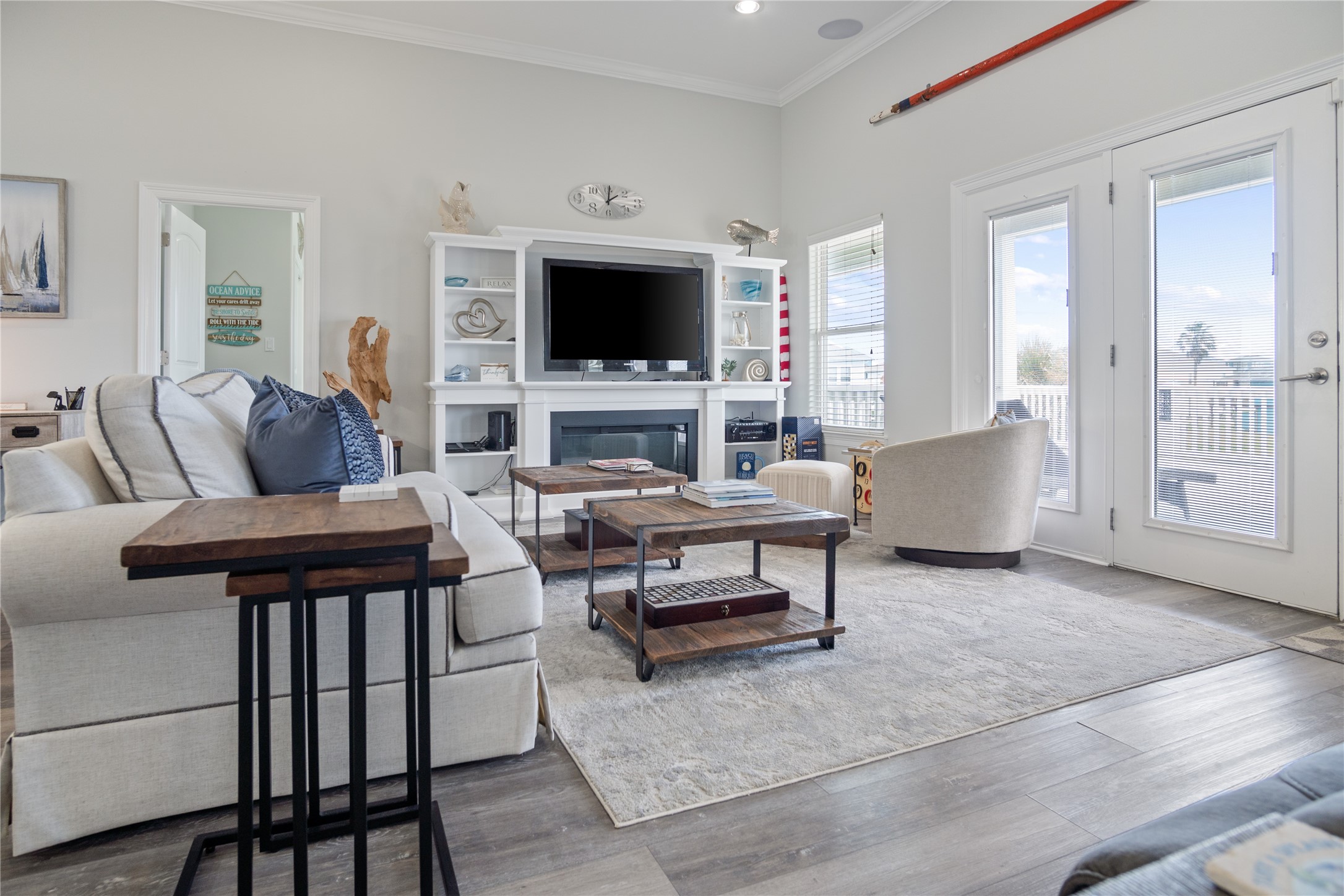 956 Biscayne Crystal Beach, TX 77650 - Photo 8 of 46 a living room with furniture and a flat screen tv