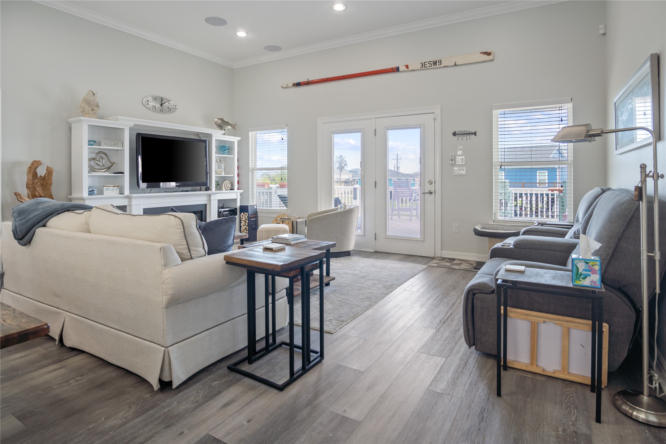 956 Biscayne Crystal Beach, TX 77650 - Photo 9 of 46 a living room with furniture and a flat screen tv