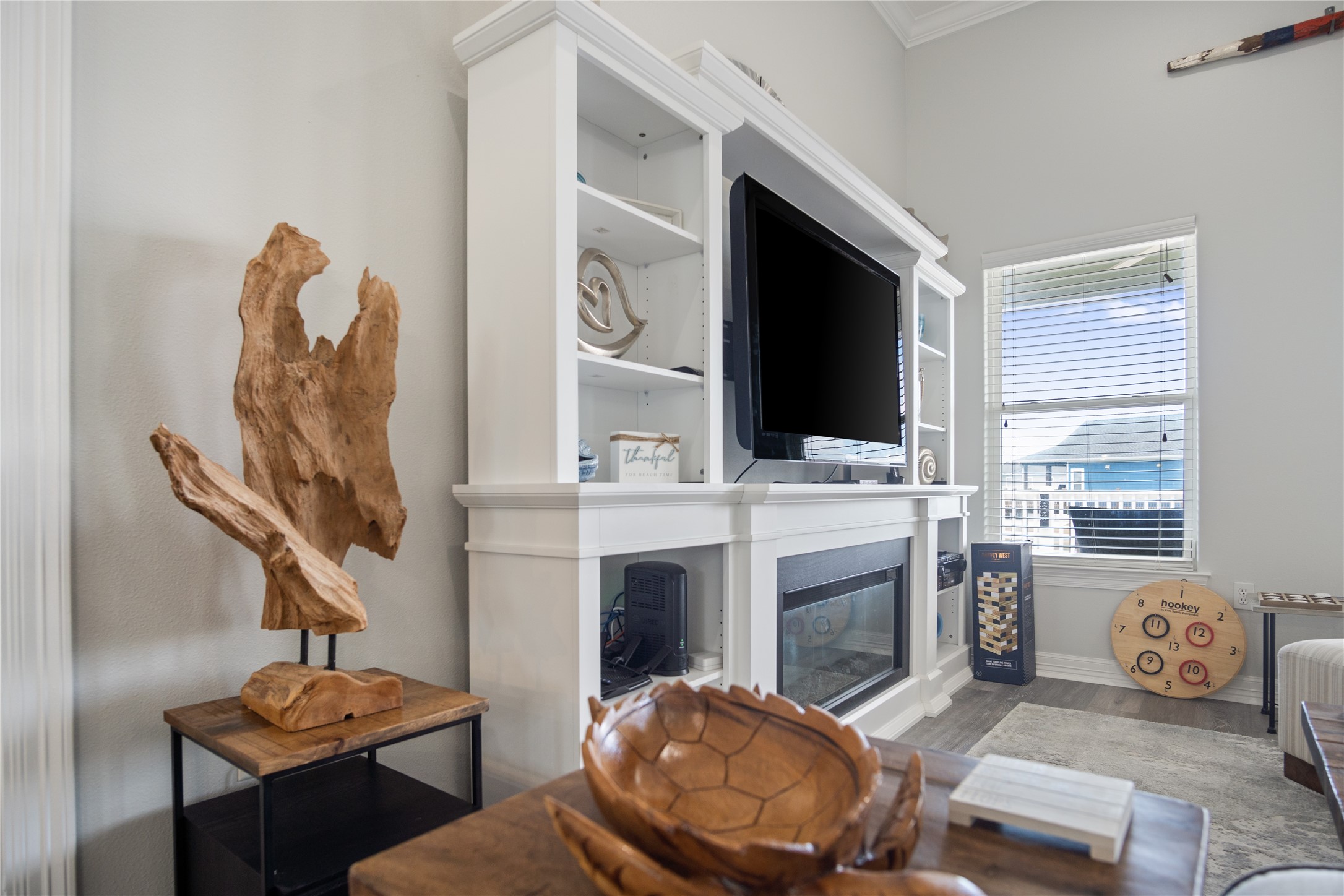 956 Biscayne Crystal Beach, TX 77650 - Photo 10 of 46 a living room with furniture a fireplace and a flat screen tv